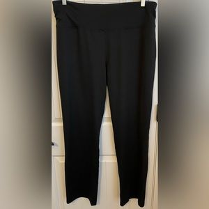 Avia women’s black yoga pants with waist tie & pocket in back in the waistband.